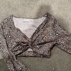I’m selling this cheetah urban outfitters top
